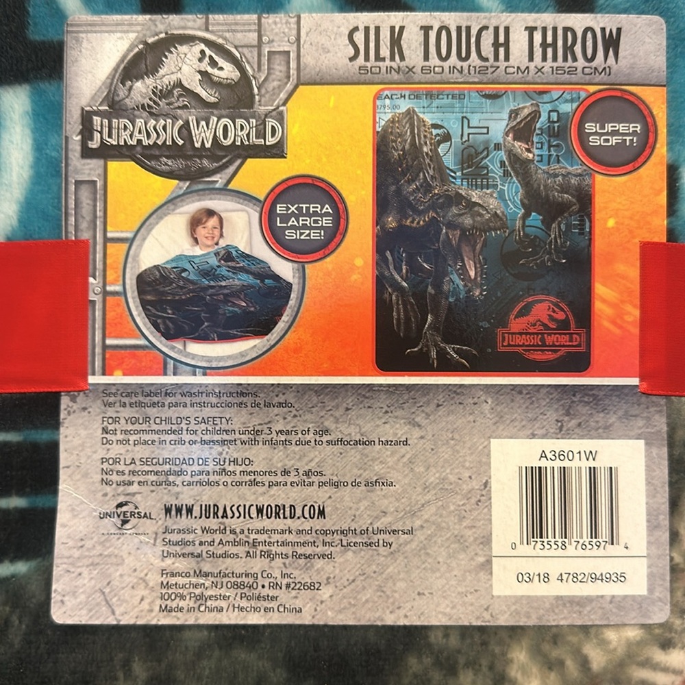Silk touch Jurassic World throw. New with tags